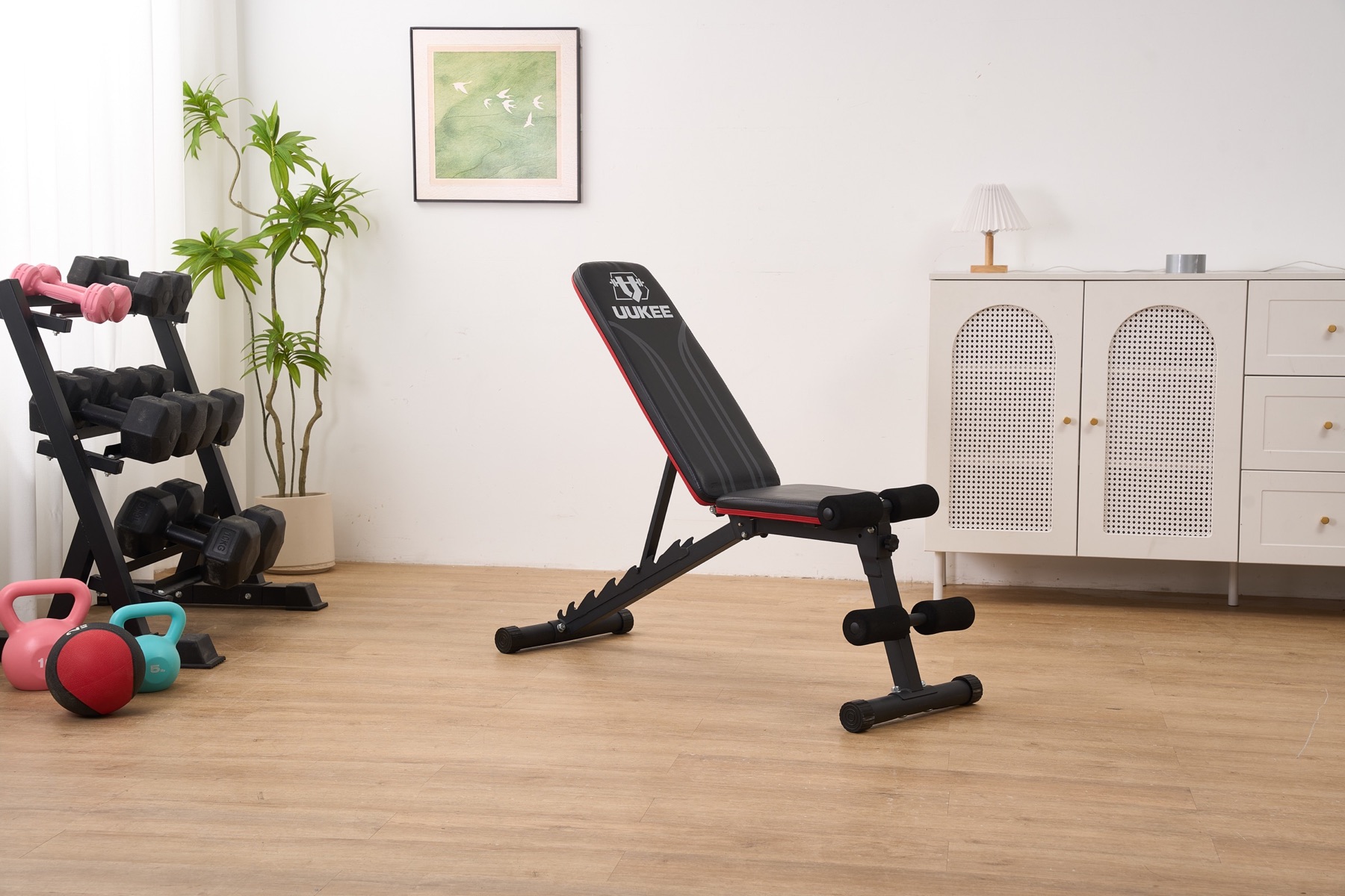 UUKEE adjustable weight bench in a home gym setting